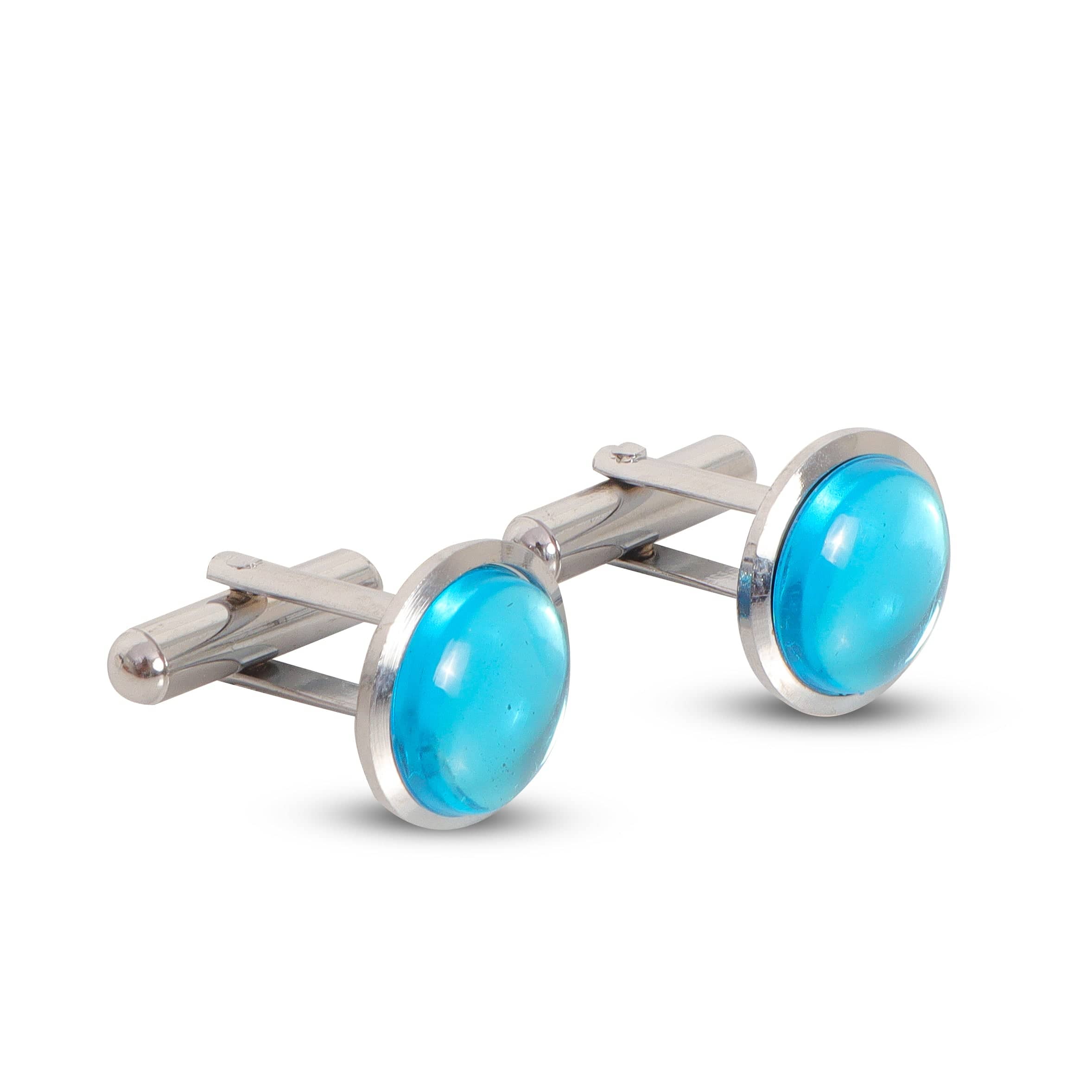 Silver cufflinks with blue gemstones on a white background