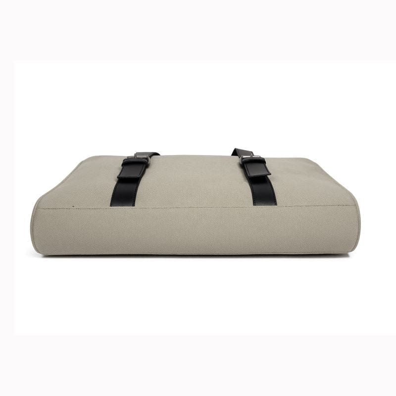 Beige cushion with black straps 
