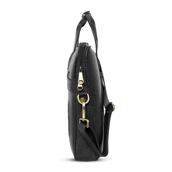 Side profile of croc-textured black leather messenger by UZR