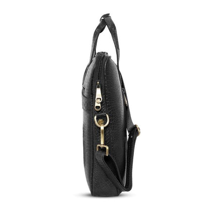 Side profile of croc-textured black leather messenger by UZR
