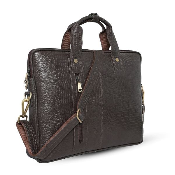 Angled view of UZR brown croc leather messenger bag