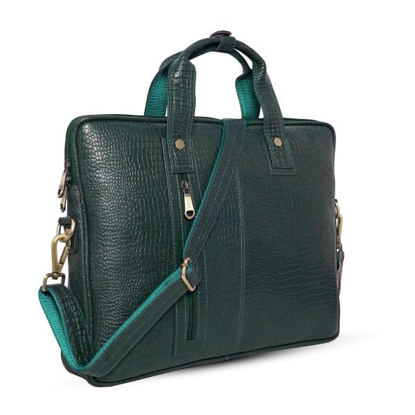 Angled view of UZR croc-textured green messenger bag