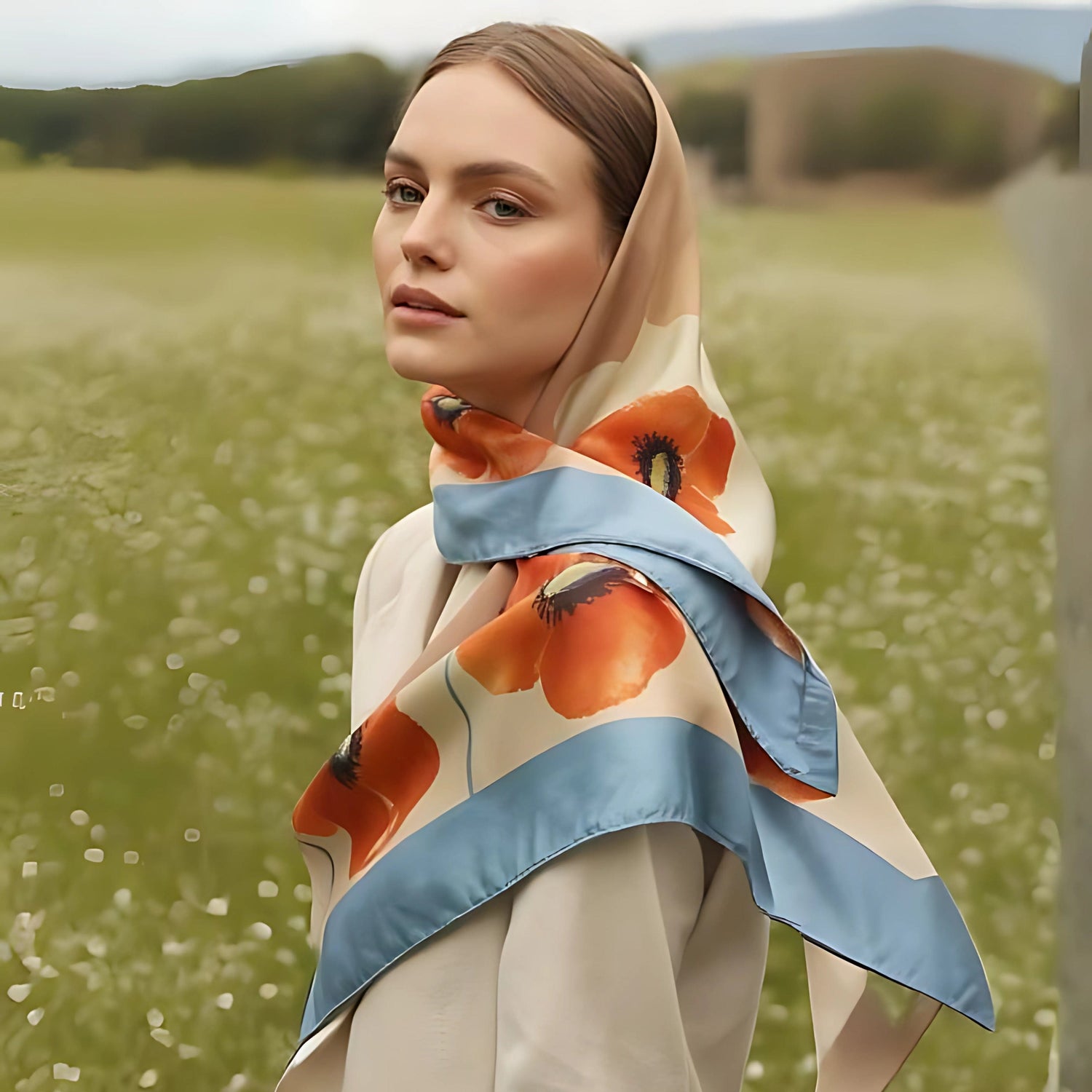 Woman wearing a floral scarf in a field